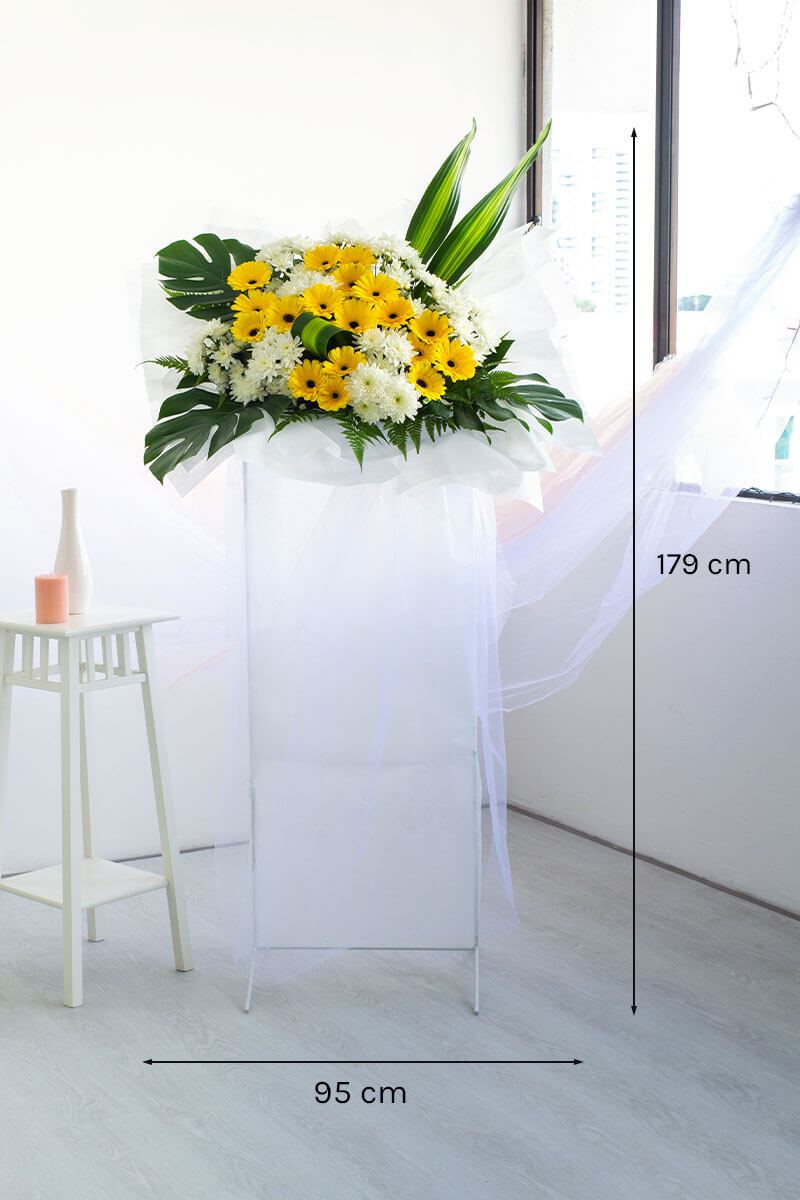 Tanvi Yellow Gerbera Condolence Flower Stand