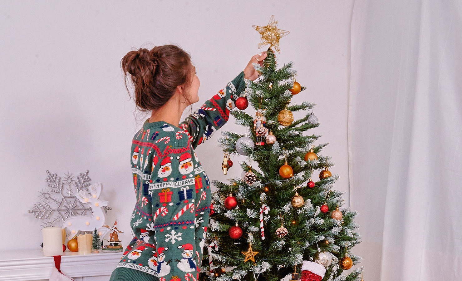 bloomthis-blog-fun-easy-christmas-decoration-ideas-01-tree-star-ornaments-girl-sweater